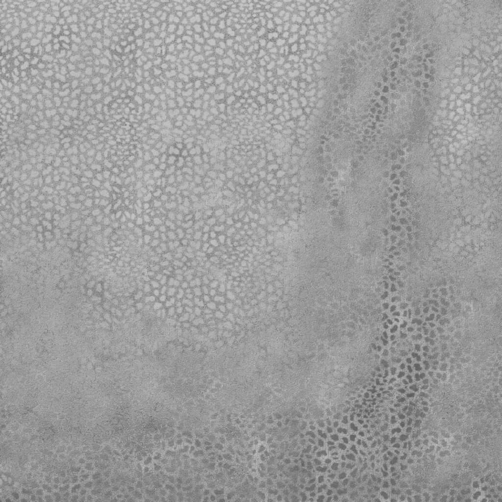 Grayscale abstract pattern on a wall surface with textured design.